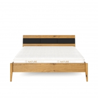 Bett aus massivem Eichenholz mit einer gepolsterten Leiste am Kopfteil - Möbel Steel